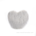 Plush silver silk heart-shaped pillow